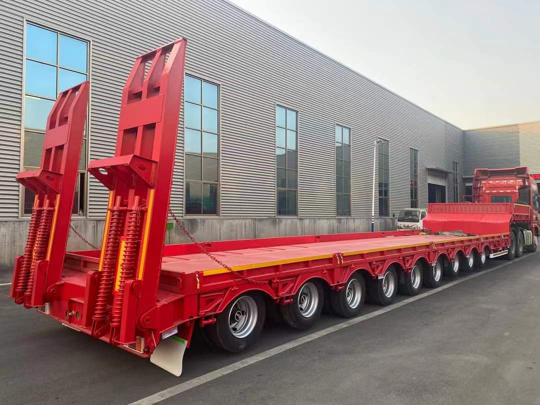 Low-flatbed semitrailer transport heavy machinery ordered by New Zealand customers